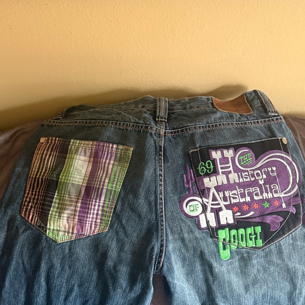 Men’s COOGI jeans purple/green on the back pockets 34/34